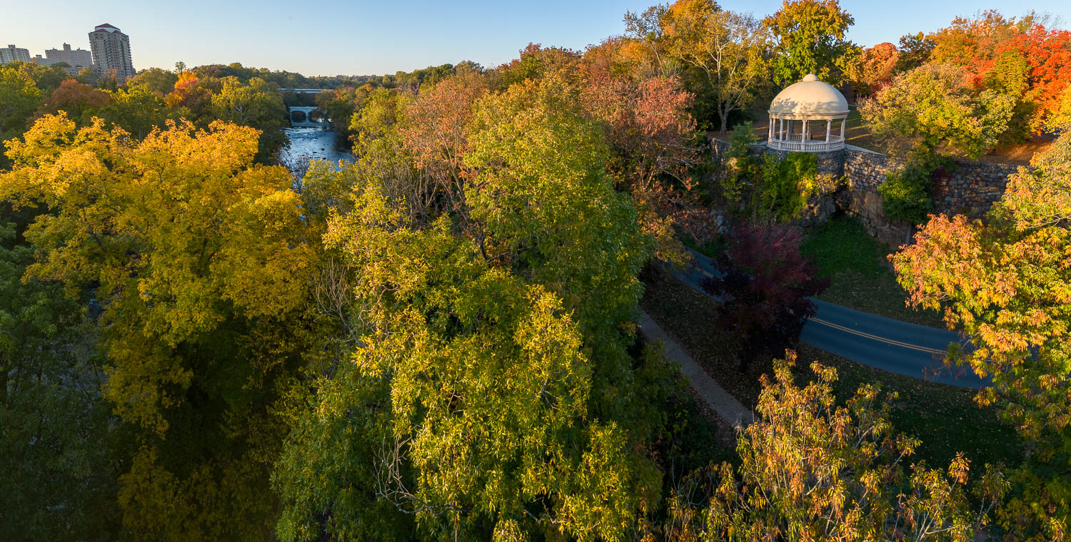 Autumn canopy above the Brandywine with the Sugar Bowl pavilion, Wilmington, aerial view